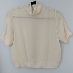 Cream mockneck silk shell from Wilfred
